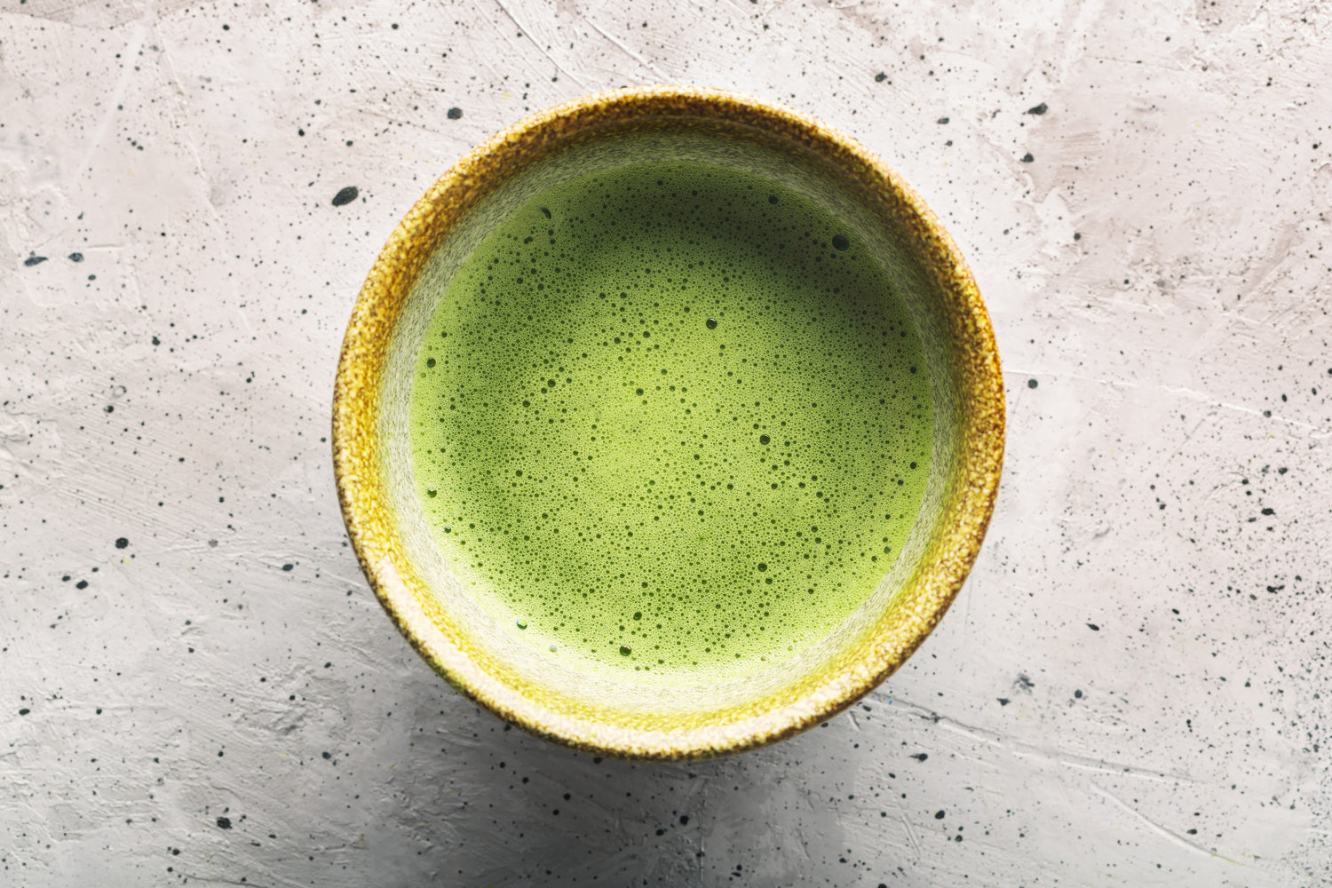 Top down shot of a bowl of ceremonial matcha.