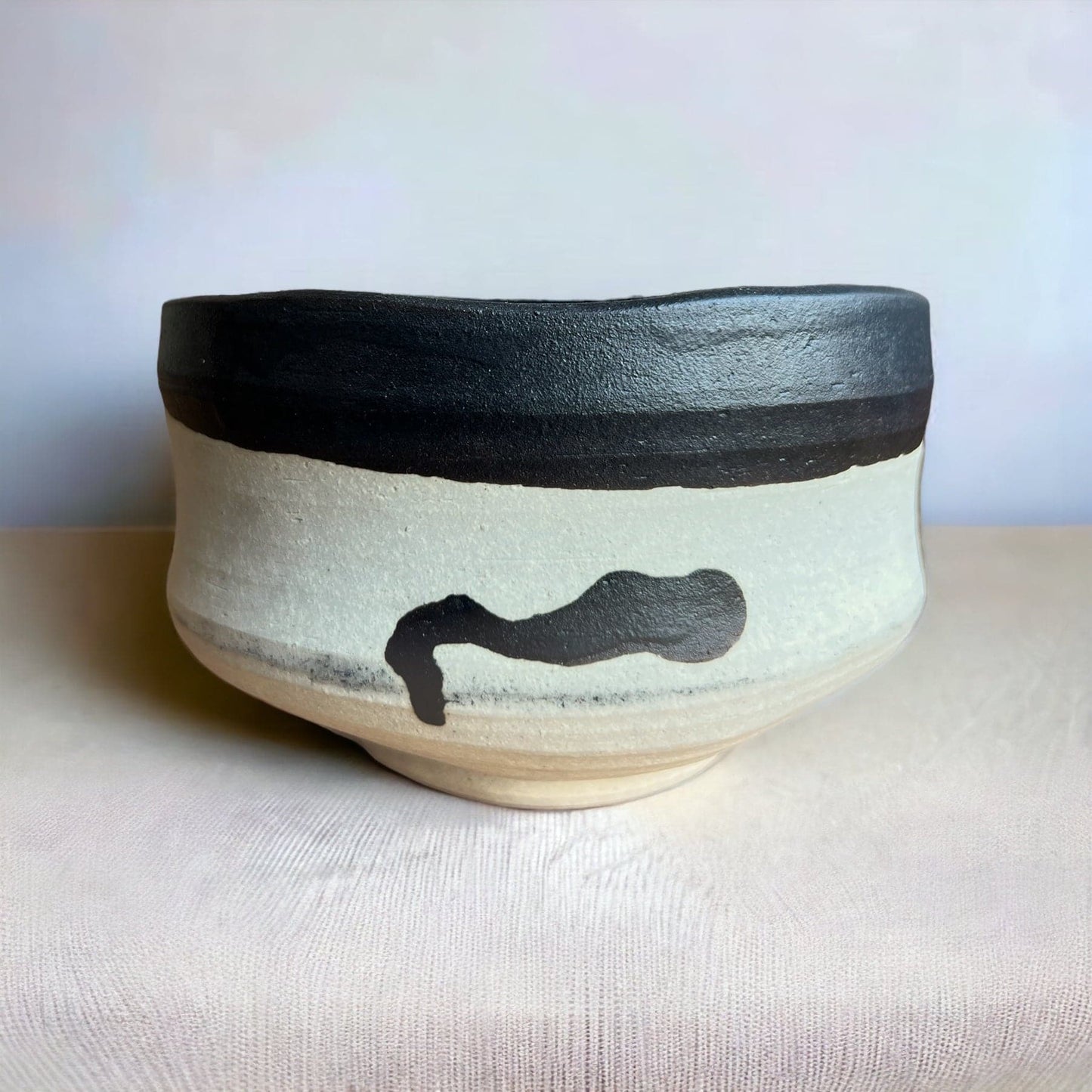 Another side of the Hand Made Ink Spot Matcha Bowl.