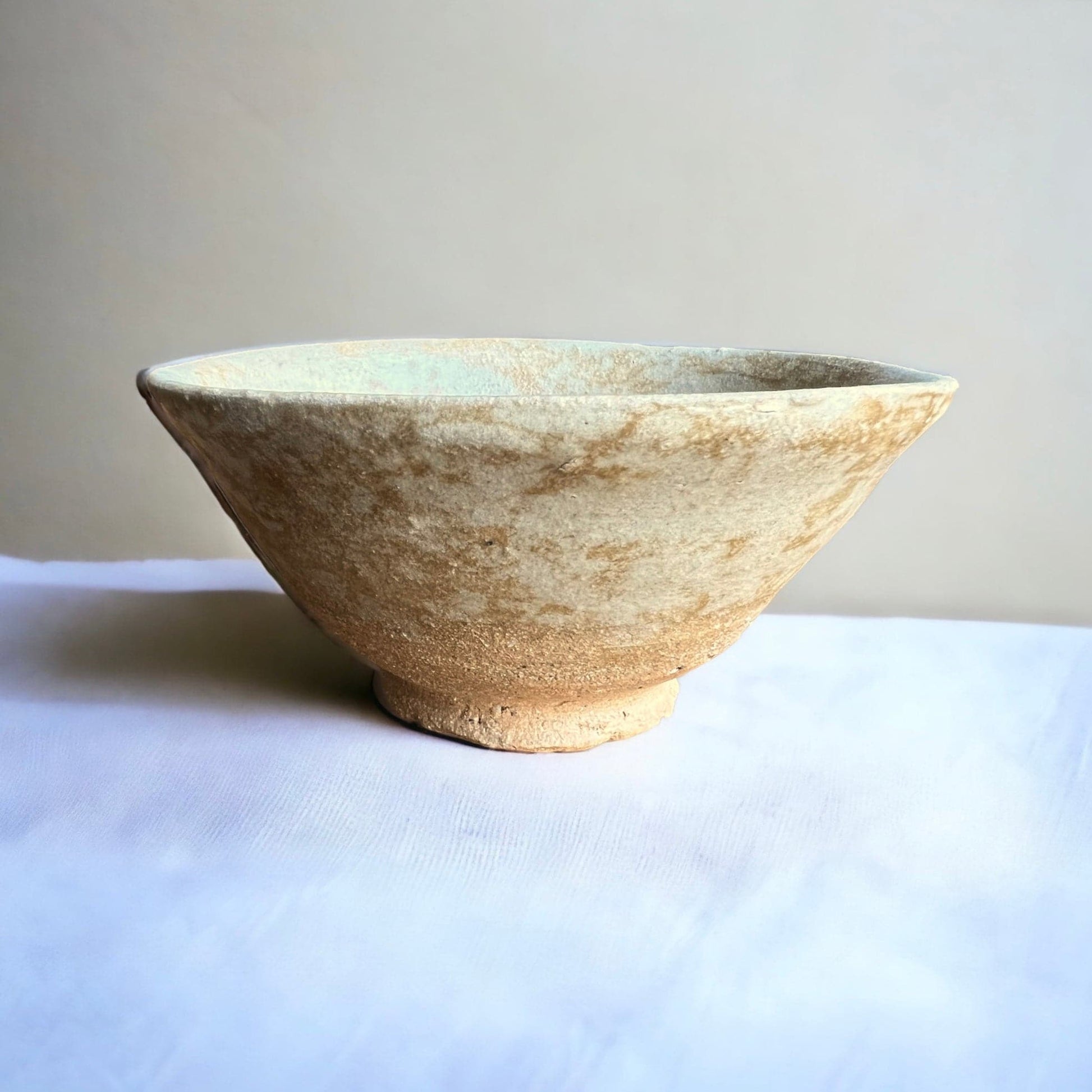 Side shot of the hand made Minnesota River Valley Matcha Bowl.